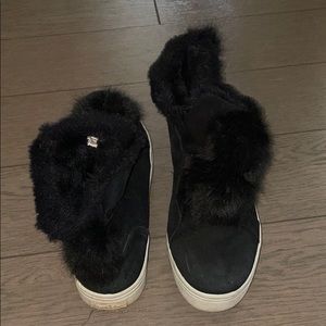 Black furry sneakers